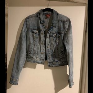 Distressed denim jacket